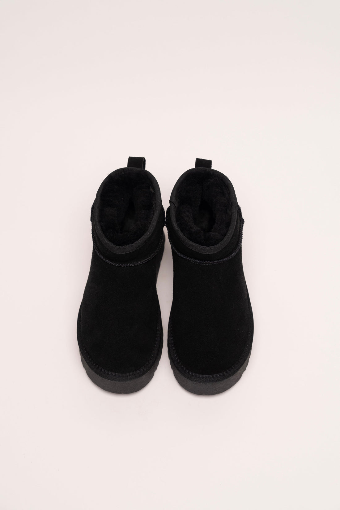Bottines à plateforme en cuir et fourrée en laine noires