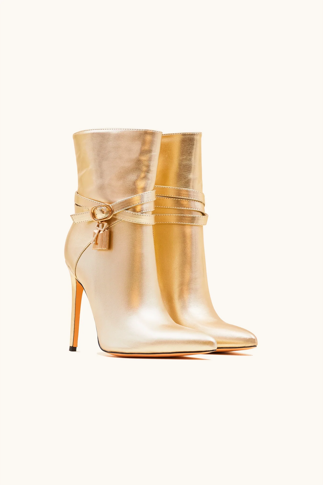Bottines à talons lock dorée
